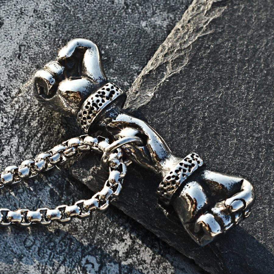FIST OF STRENGTH STAINLESS STEEL PENDANT